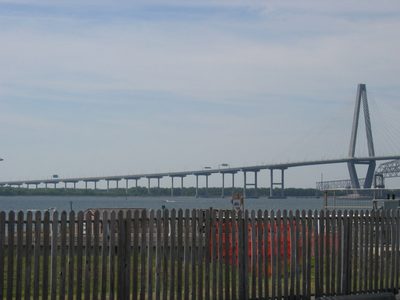 Bridge entrance with portions of the old bridge